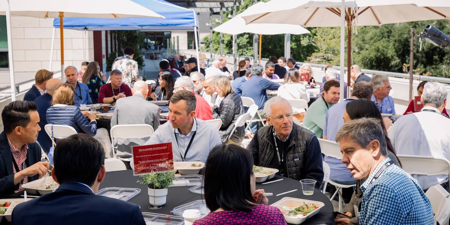 portrait photos of two MS&E alums